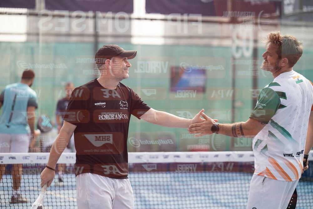 Post-match handshake at the net